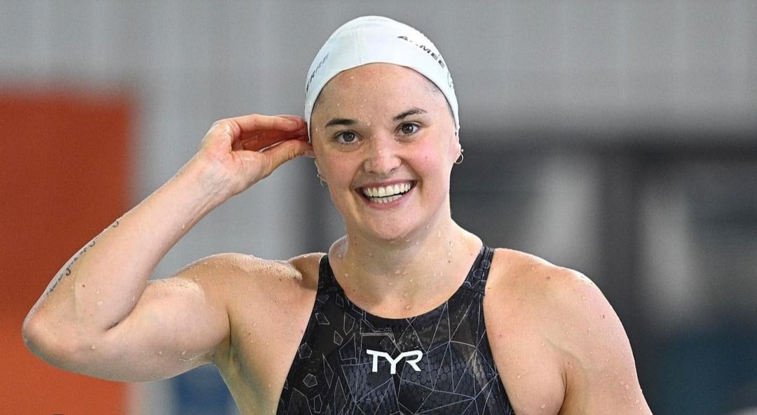 Camille Thiré souriante avec une casquette 